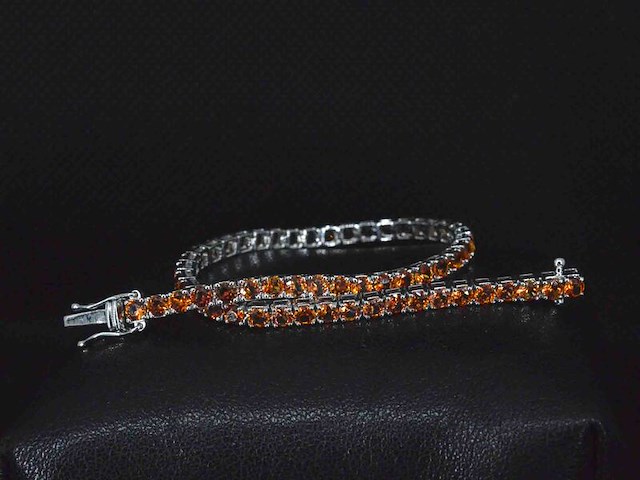 Gouden tennisarmband met 8.00 carat aan oranje saffieren - afbeelding 1 van  10