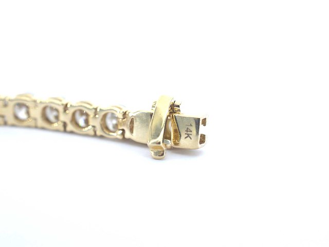 Gouden tennisarmband met briljant diamanten - afbeelding 5 van  5