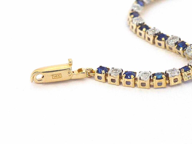 Gouden tennisarmband met diamanten en saffieren - afbeelding 9 van  9