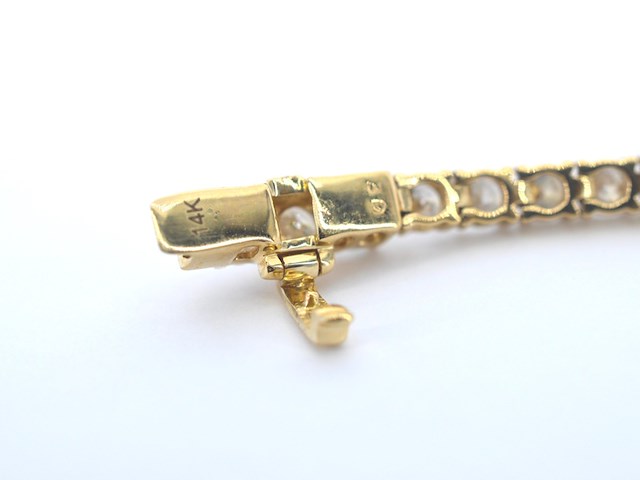 Gouden tennisarmband met natuurlijke briljant geslepen diamanten - afbeelding 4 van  6