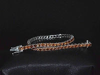 Gouden tennisarmband oranje saffier