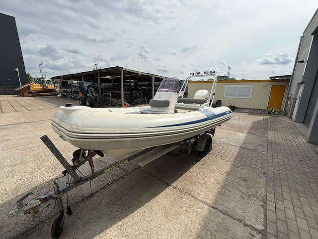 Grand goldenline rib boot met trailer en buitenboordmotor 75pk - afbeelding 30 van  35