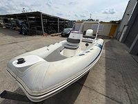Grand goldenline rib boot met trailer en buitenboordmotor 75pk - afbeelding 25 van  28