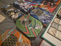 Grote pokémon verzameling – o.a. vintage kaarten, mappen en tins - afbeelding 2 van  65
