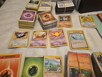 Grote pokémon verzameling (veel vintage, 3 gevulde mappen, accessoires + meerdere grote stapels kaarten) - afbeelding 6 van  22