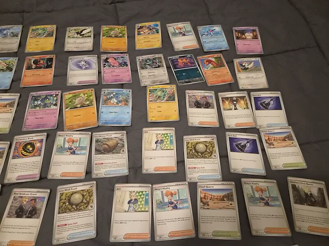 Grote pokémonkaartenverzameling met zeldzame kaarten, verzamelmap en pokémon-blik - afbeelding 25 van  26