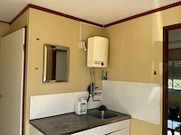 Grote unit voorzien van hal, keuken, toilet en afzonderlijke ruimte - afbeelding 9 van  20