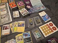 Grote verzameling pokémon kaarten met gevulde map, vintage kaarten, sleeves en accessoires - afbeelding 36 van  38