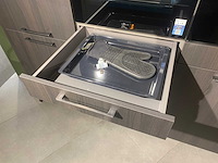 Häcker systemat - showroomkeuken met siemens studioline apparatuur - afbeelding 5 van  25
