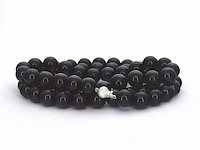 Halsketting met onix edelsteen en een witgouden sluiting met diamant - afbeelding 7 van  8