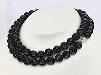 Halsketting onix witgouden sluiting diamant