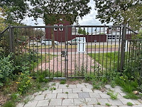 Heras - dubbele afsluitbare draaipoort - afbeelding 1 van  5