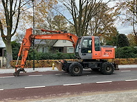 Hitachi - 2008 - zx130w - banden graafmachine - afbeelding 1 van  26