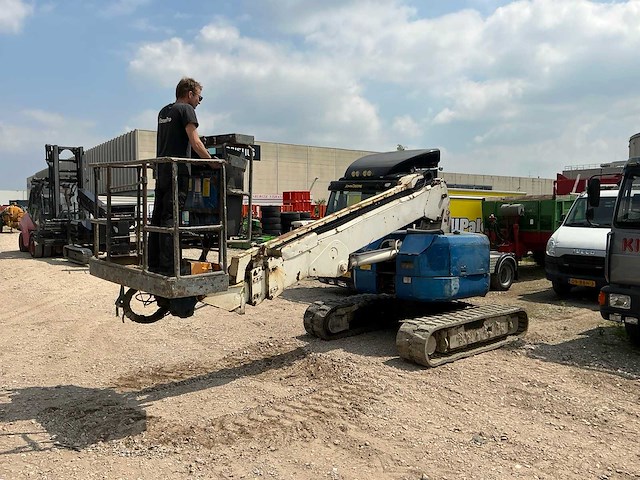 Hitachi hx99b telescoop hoogwerker - afbeelding 1 van  11