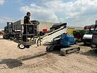 Hitachi hx99b telescoop hoogwerker - afbeelding 1 van  15