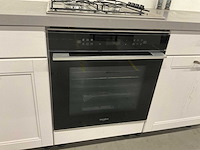 Hoekopgestelde showroomkeuken - afbeelding 14 van  24