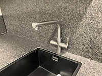 Hoekopgestelde showroomkeuken - afbeelding 4 van  21