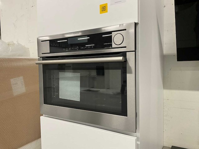 Hoekopgestelde showroomkeuken - afbeelding 4 van  20