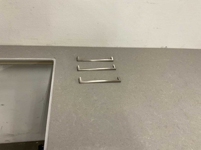 Hoekopgestelde showroomkeuken - afbeelding 19 van  20