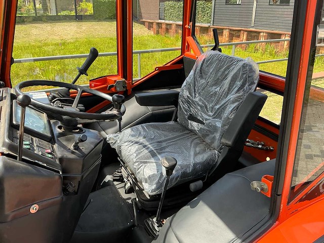 Holder c860 vierwielaangedreven kniktractor - afbeelding 10 van  26