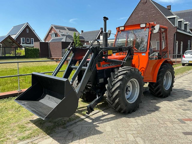 Holder c860 vierwielaangedreven kniktractor - afbeelding 1 van  26