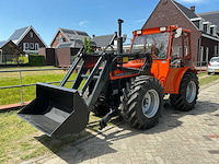 Holder c860 vierwielaangedreven kniktractor