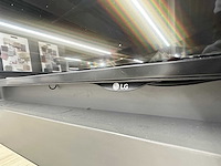 Houten "inspiratie" wand met lg monitor - afbeelding 3 van  3