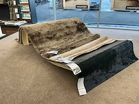 Houten tapijtdisplay