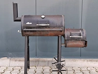 Houtskool barbecue, el fuego
