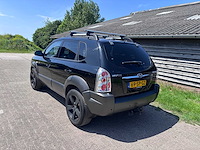Hyundai - 2006 - tucson - 2.0i 4wd style - personenauto - afbeelding 13 van  21