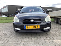 Hyundai - 2009 - accent - personenauto - afbeelding 15 van  22
