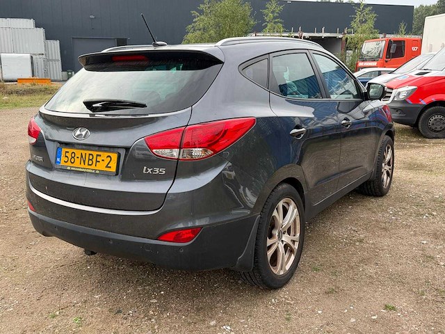 Hyundai - 2010 - ix35 - 2.0i i-catcher - personenauto - afbeelding 12 van  31
