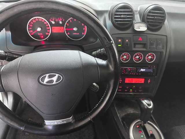 Hyundai - coupé - 2.7i v6 fx automaat- 30-np-sx- 2003 - afbeelding 11 van  13