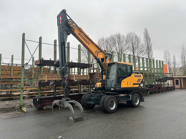 Hyundai - hw180 - bandenkraan met kinshoffer houtklem - afbeelding 1 van  29