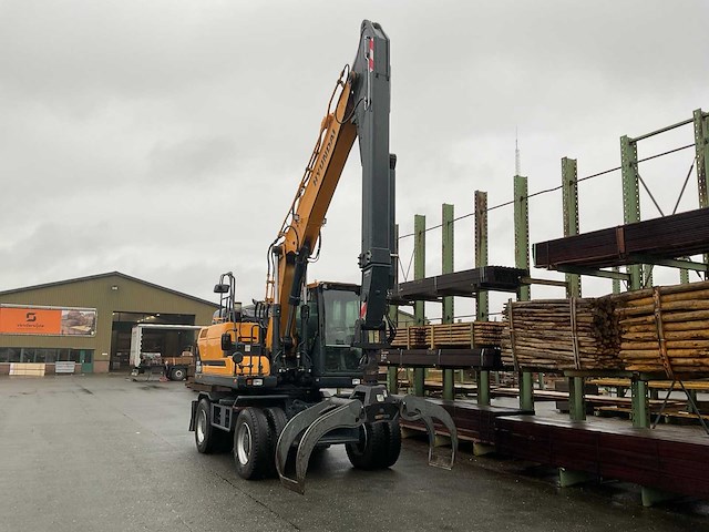 Hyundai - hw180 - bandenkraan met kinshoffer houtklem - afbeelding 12 van  29