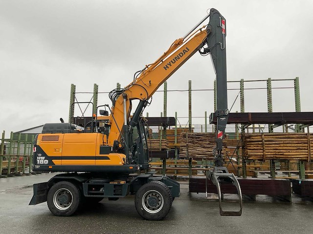 Hyundai - hw180 - bandenkraan met kinshoffer houtklem - afbeelding 23 van  29