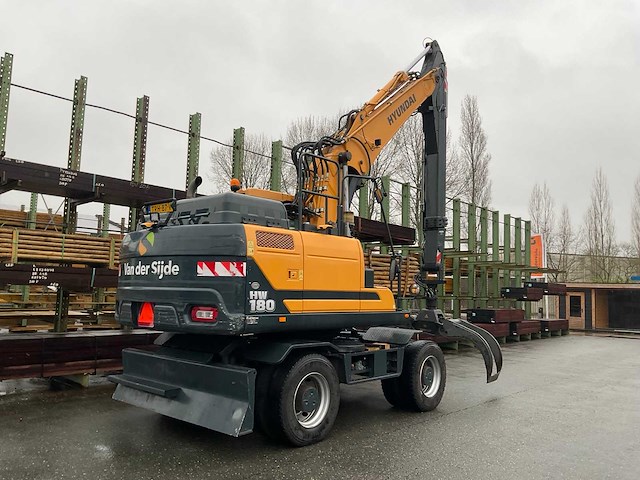 Hyundai - hw180 - bandenkraan met kinshoffer houtklem - afbeelding 24 van  29
