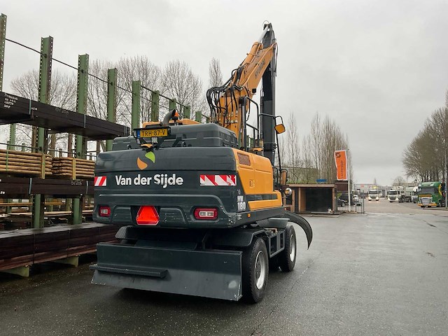 Hyundai - hw180 - bandenkraan met kinshoffer houtklem - afbeelding 25 van  29