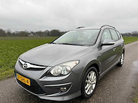 Hyundai - i30 cw - 1.4i i-motion bns. - 57-shl-4 - 2011 - afbeelding 1 van  8
