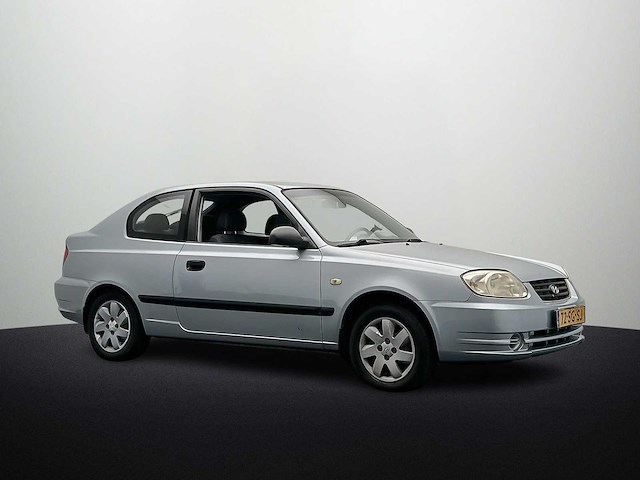 Hyundai accent 1.3i active young | 72-sg-sj - afbeelding 1 van  18