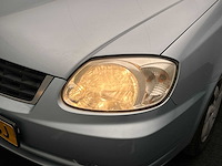 Hyundai accent 1.3i active young | 72-sg-sj - afbeelding 17 van  18