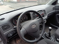 Hyundai accent 1.4i dynamic, 18-tf-kx - afbeelding 11 van  13