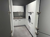 Impuls - bijkeuken met bauknecht wasmachine