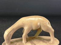 In steen gesneden beest - afbeelding 1 van  5