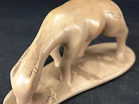 In steen gesneden beest - afbeelding 2 van  5