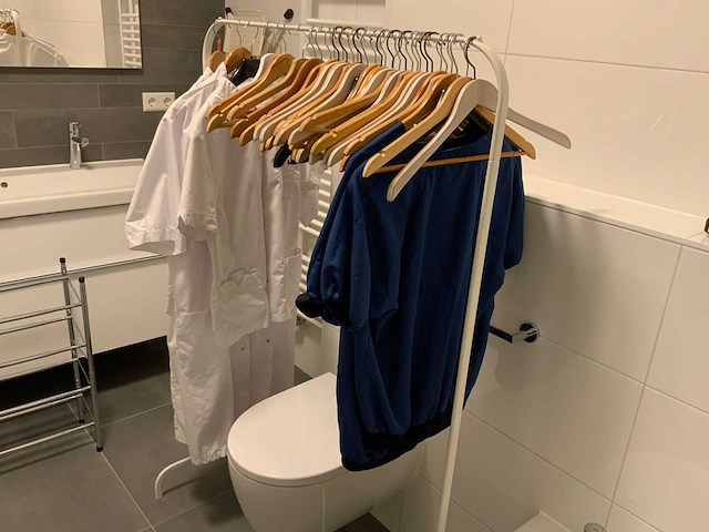 Inhoud kleedruimte - afbeelding 11 van  14