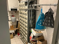 Inhoud magazijnruimte - afbeelding 1 van  12
