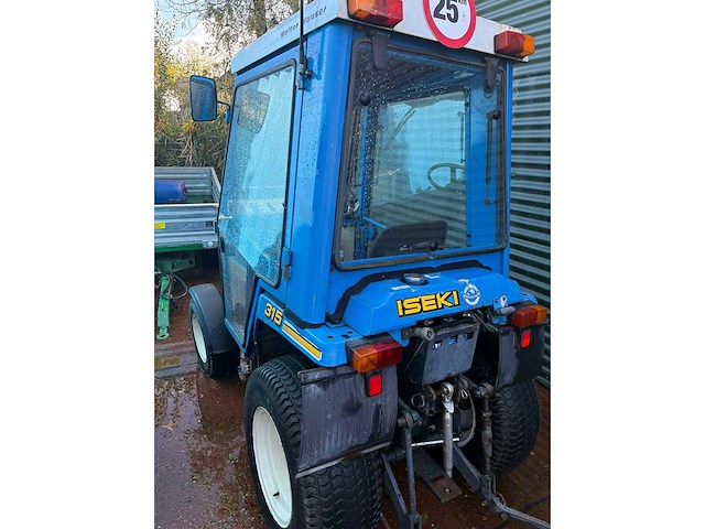 Iseki 315 minitractor met diverse aanbouwdelen en aanhanger - afbeelding 22 van  26