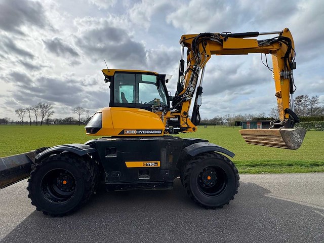 Jcb 2017 hydradig banden graafmachine - afbeelding 18 van  22