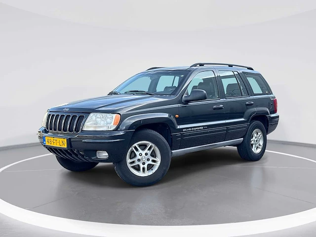 Jeep grand cherokee 4.7i v8 limited | 48-ft-ln - afbeelding 1 van  29